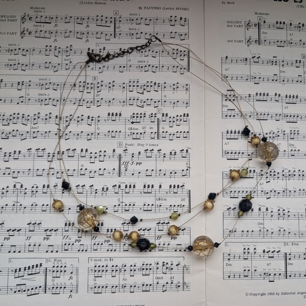 Elegant Gold and Black Beaded Necklace